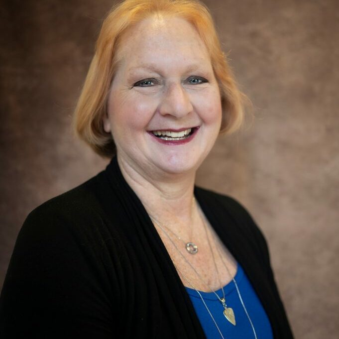 Headshot photo of Rev. Holly Irvin, Associate Minister.